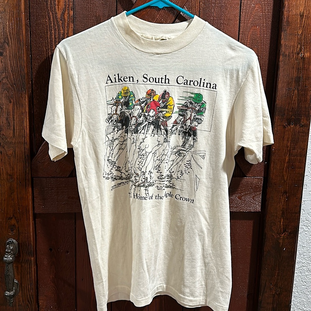 Vintage Aiken South Carolina Home of the Triple Crown beige Jockey shirt.